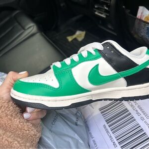 Nike  Sneakers in Green, Black, and White